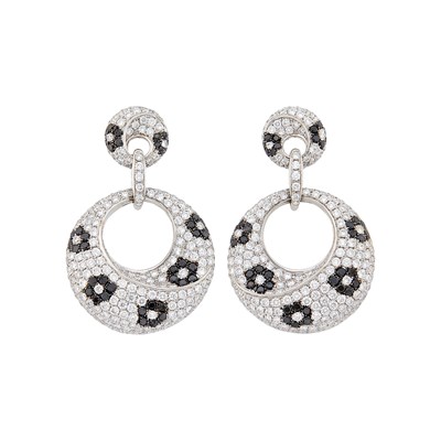Lot 1094 - Pair of White Gold, Diamond and Black Diamond Flower Pendant-Earrings