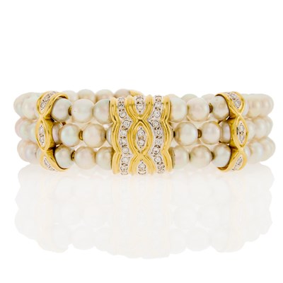 Lot 2092 - Triple Row Cultured Pearl, Two-Color Gold and Diamond Cuff Bracelet