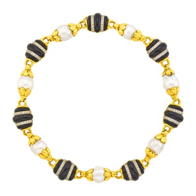 Lot 1182 - Two-Color Hammered Gold, Baroque South Sea Cultured Pearl, Black Onyx and Diamond Necklace