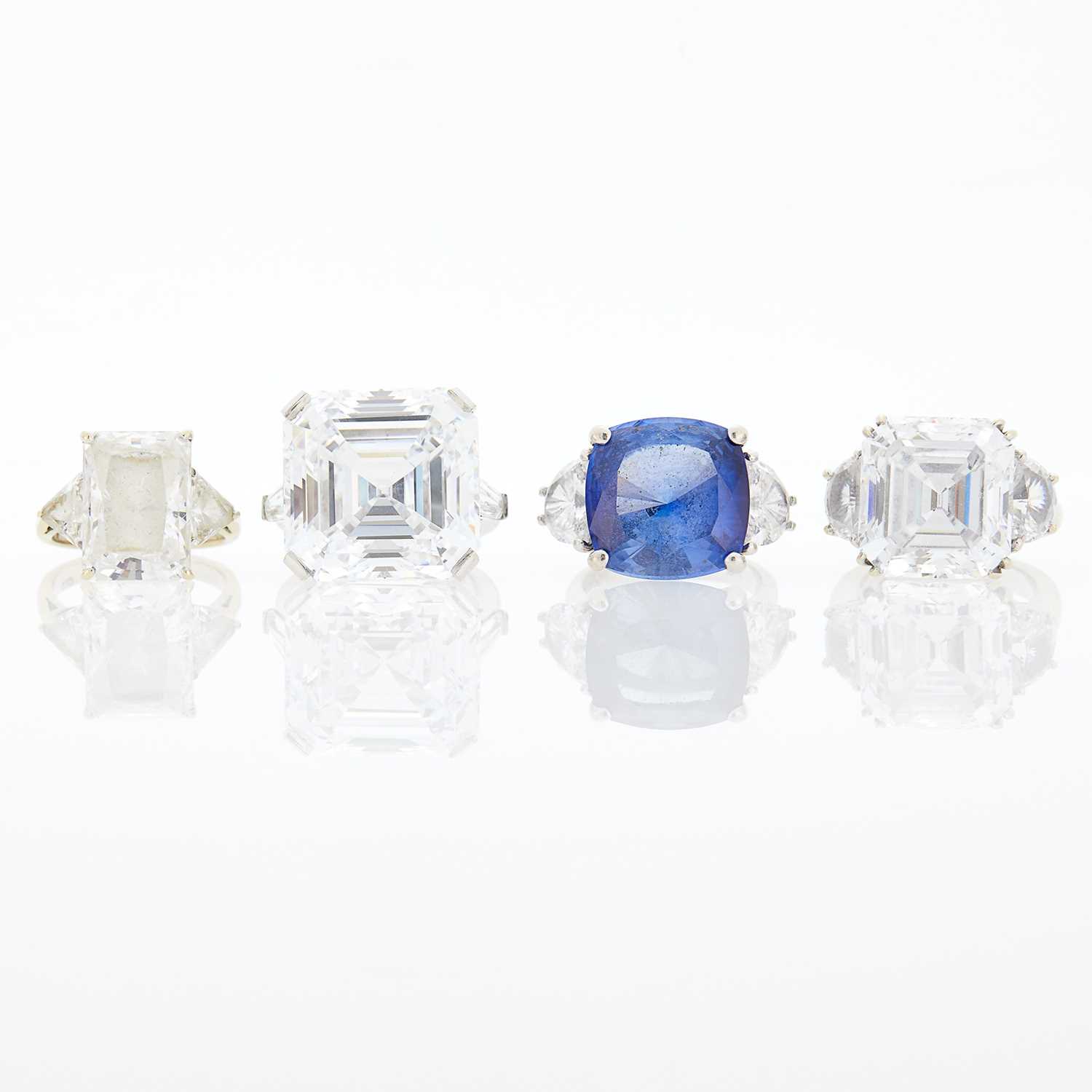 Lot 2297 - Four White Gold and Simulated Stone Rings