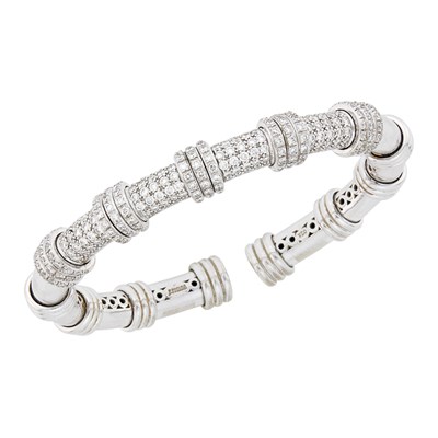 Lot 1095 - White Gold and Diamond Bangle Bracelet