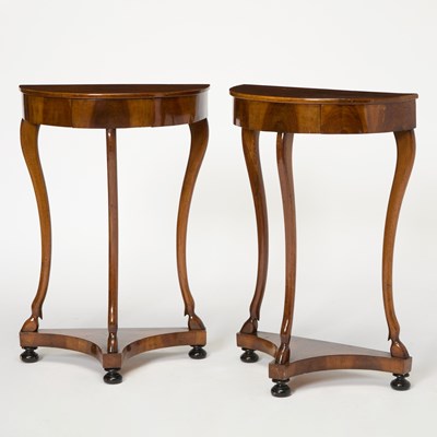 Lot 487 - Pair of Italian Neoclassical Ebonized and Walnut Demilune Console Tables
