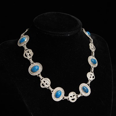 Lot 211 - Sterling Silver and Lapis Necklace with Faces