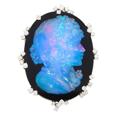 Lot 1117 - White Gold, Carved Opal, Black Onyx and Diamond Pendant-Brooch