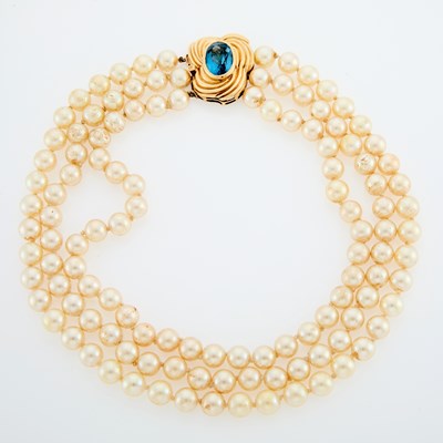 Lot 1176 - Triple Strand Imitation Pearl Necklace with Gold and Blue Topaz Clasp