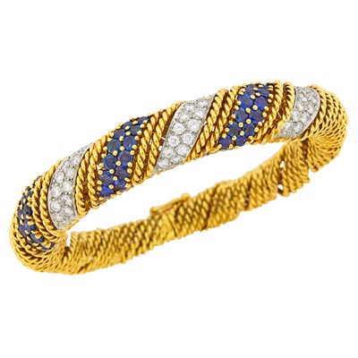 Lot 1146 - Two-Color Gold, Sapphire and Diamond Bombé Bangle Bracelet