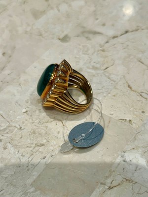 Lot 1186 - Gold, Cabochon Emerald and Diamond Ring
