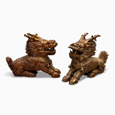 Lot 1112 - Pair of Chinese Red Lacquer and Gilt Qilin