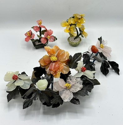 Lot 1129 - Three Hardstone Flower Table Ornaments