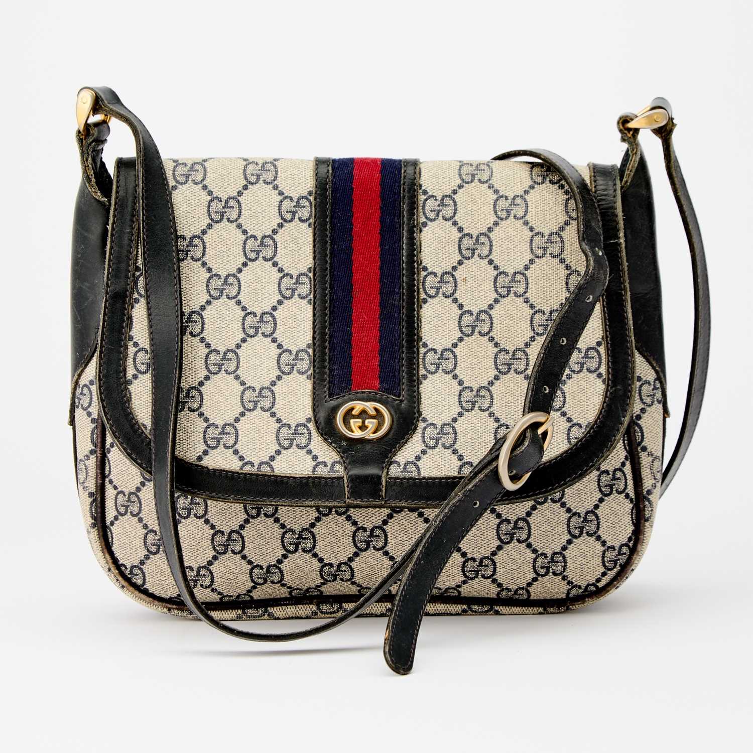 Lot 2344 - Vintage Gucci Navy Blue Canvas and Leather Ophidia Bag