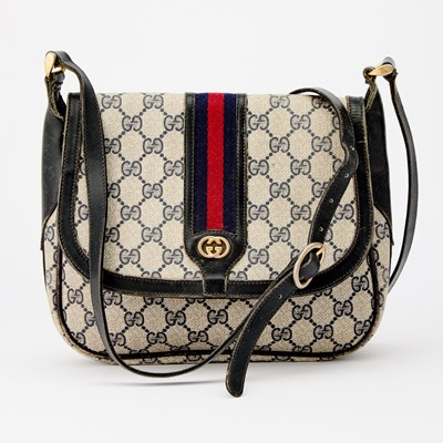 Lot 2344 - Vintage Gucci Navy Blue Canvas and Leather Ophidia Bag