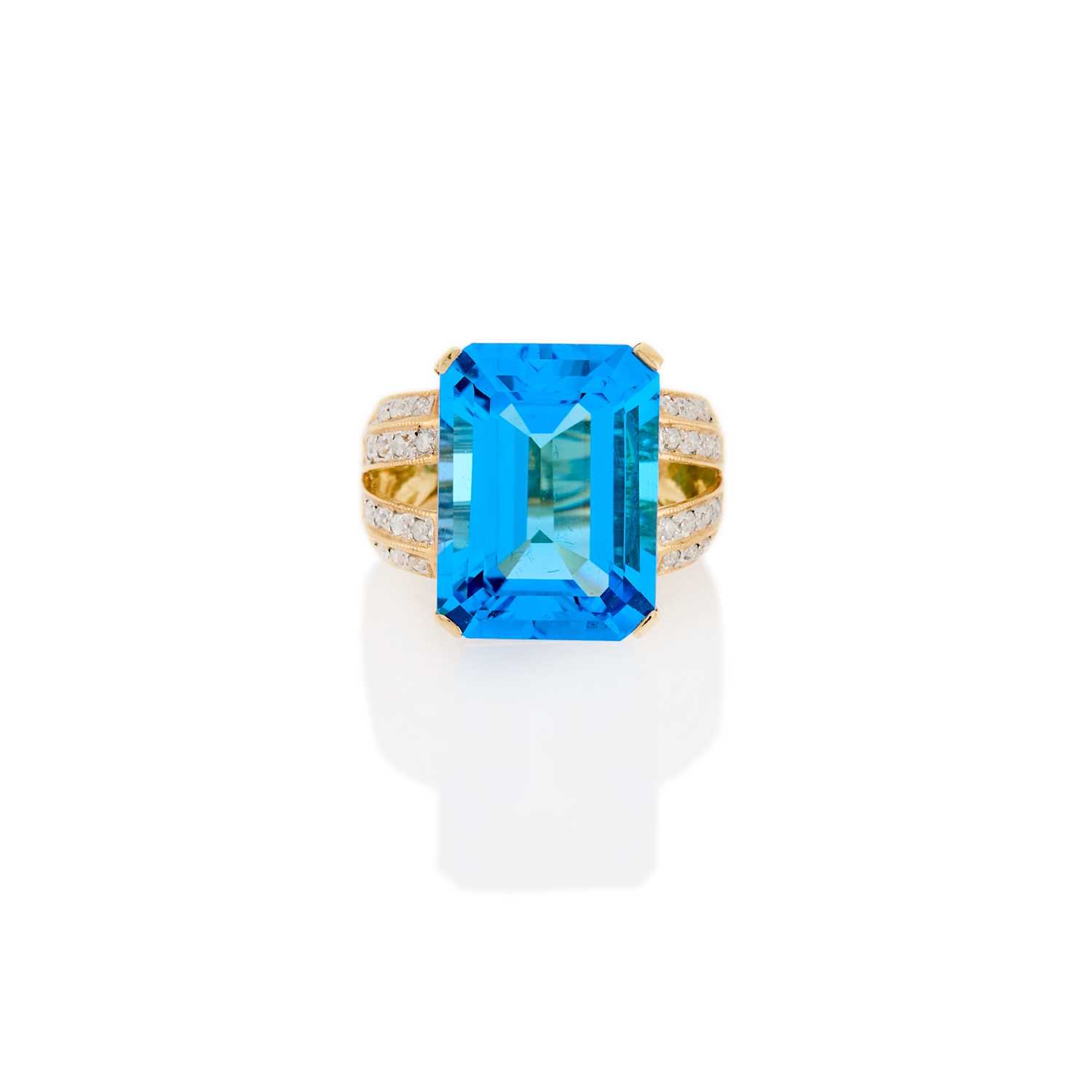 Lot 2270 - Gold, Simulated Blue Stone and Diamond Ring