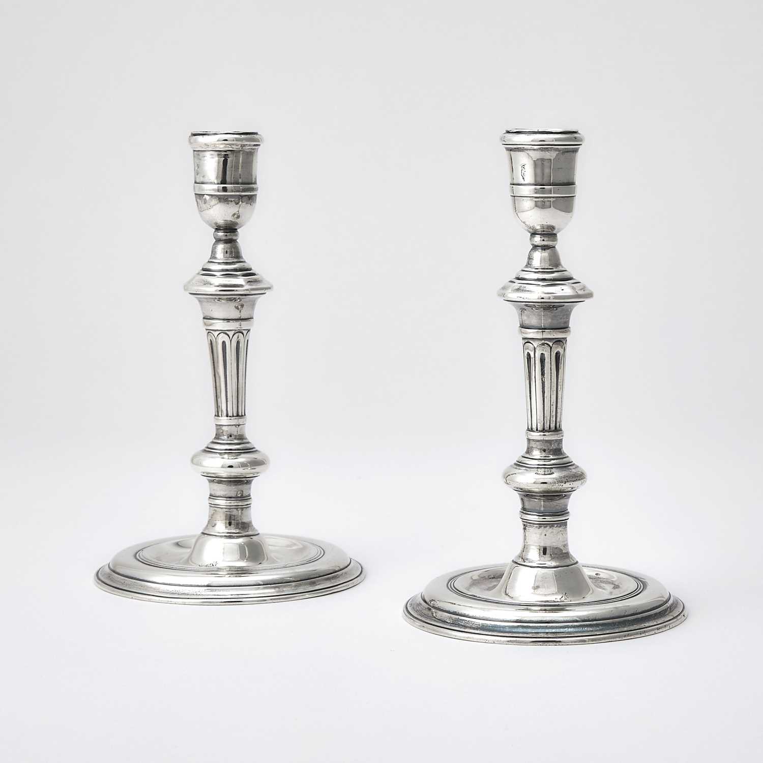 Lot 95 - Pair of Irish Georgian Sterling Silver Candlesticks