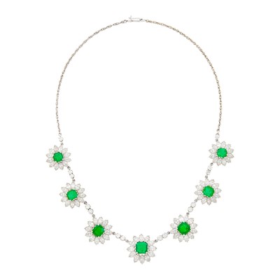 Lot 1086 - Platinum, White Gold, Emerald and Diamond Flower Necklace