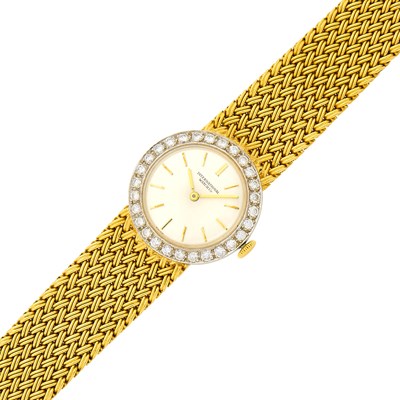 Lot 1140 - International Watch Co. Two-Color Gold and Diamond Mesh Wristwatch