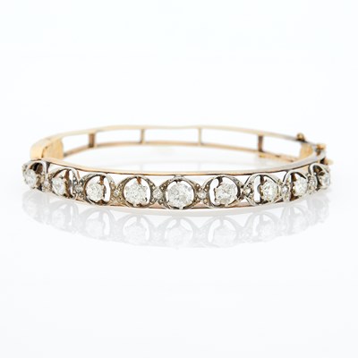 Lot 1204 - Antique Gold, Platinum and Diamond Bangle Bracelet