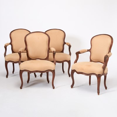 Lot 245 - Set of Four Louis XV Upholstered Walnut Fauteuils