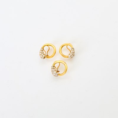 Lot 73 - Aldo Cipullo Pair of Two-Color Gold and Diamond Hoop Earclips and Single Earclip