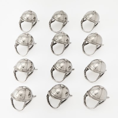 Lot 125 - Set of Twelve Silver Plated Novelty Jockey Cap-Form Napkin Rings