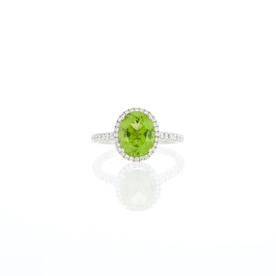 Lot 1135 - White Gold, Peridot and Diamond Ring