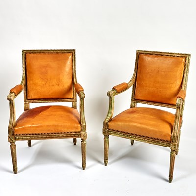 Lot 560 - Pair of Louis XVI Leather Upholstered Painted Wood Fauteuils