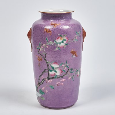Lot 264 - A Chinese Lavender Ground Sgraffito Tapering Cylindrical Vase with Molded Handles