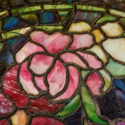 Lot 233 - Tiffany Studios Bronze and Leaded Glass Peony Table Lamp