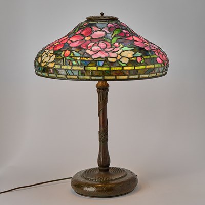 Lot 233 - Tiffany Studios Bronze and Leaded Glass Peony Table Lamp