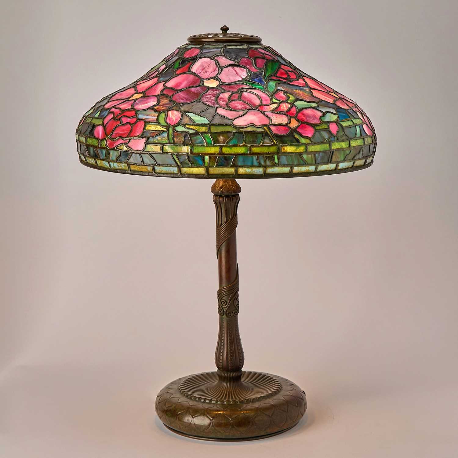 Lot 233 - Tiffany Studios Bronze and Leaded Glass Peony Table Lamp