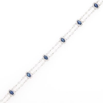 Lot 1112 - White Gold, Sapphire and Diamond Bracelet