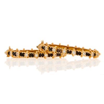 Lot 1206 - Pair of Gold, Black Enamel and Diamond Bangle Bracelets
