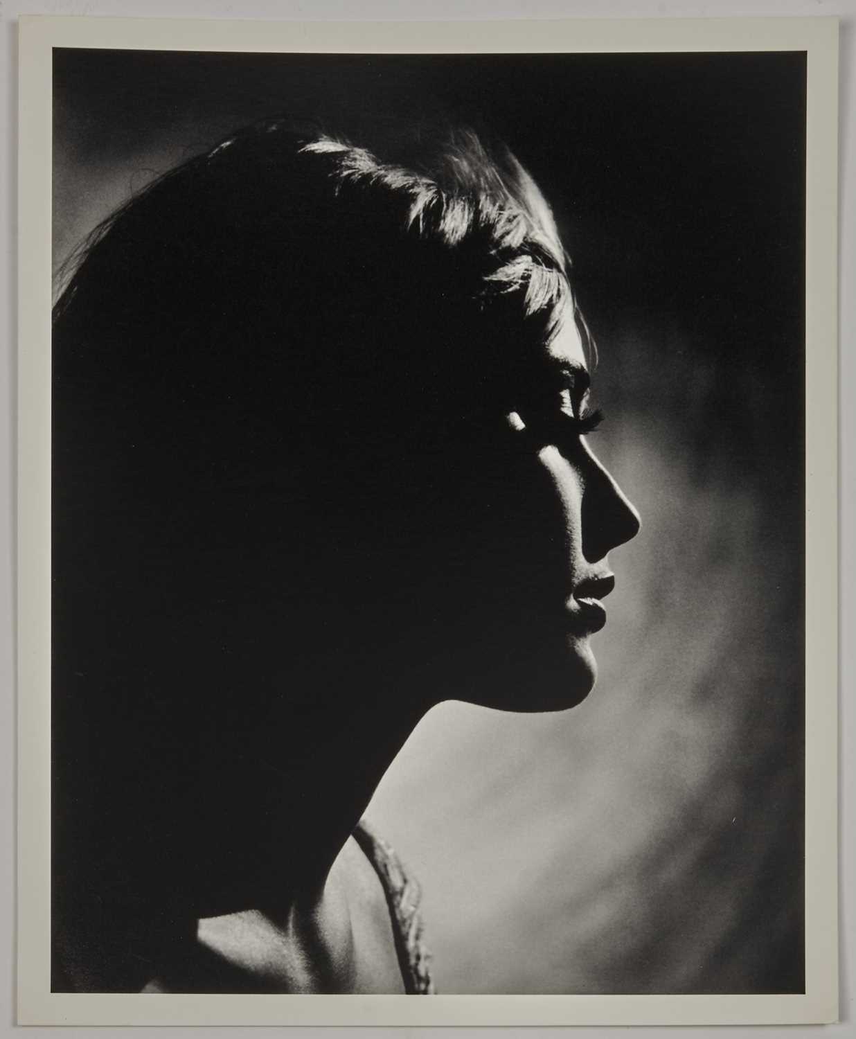 Lot 11 - A fine, dark portrait of Sharon Tate by Philippe Halsman