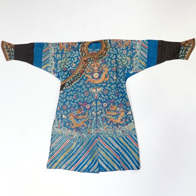 Lot 377 - A Chinese Blue Ground Embroidered Silk 'Dragon' Robe