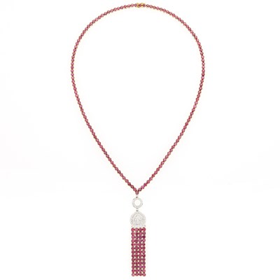 Lot 1216 - Two-Color Gold, Ruby and Diamond Tassel Pendant-Necklace
