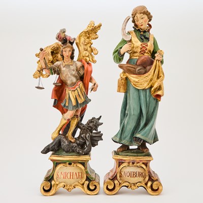 Lot 691 - Two South German or Tyrol Rococo Style Polychrome Carved Lindenwood Figures of Saints