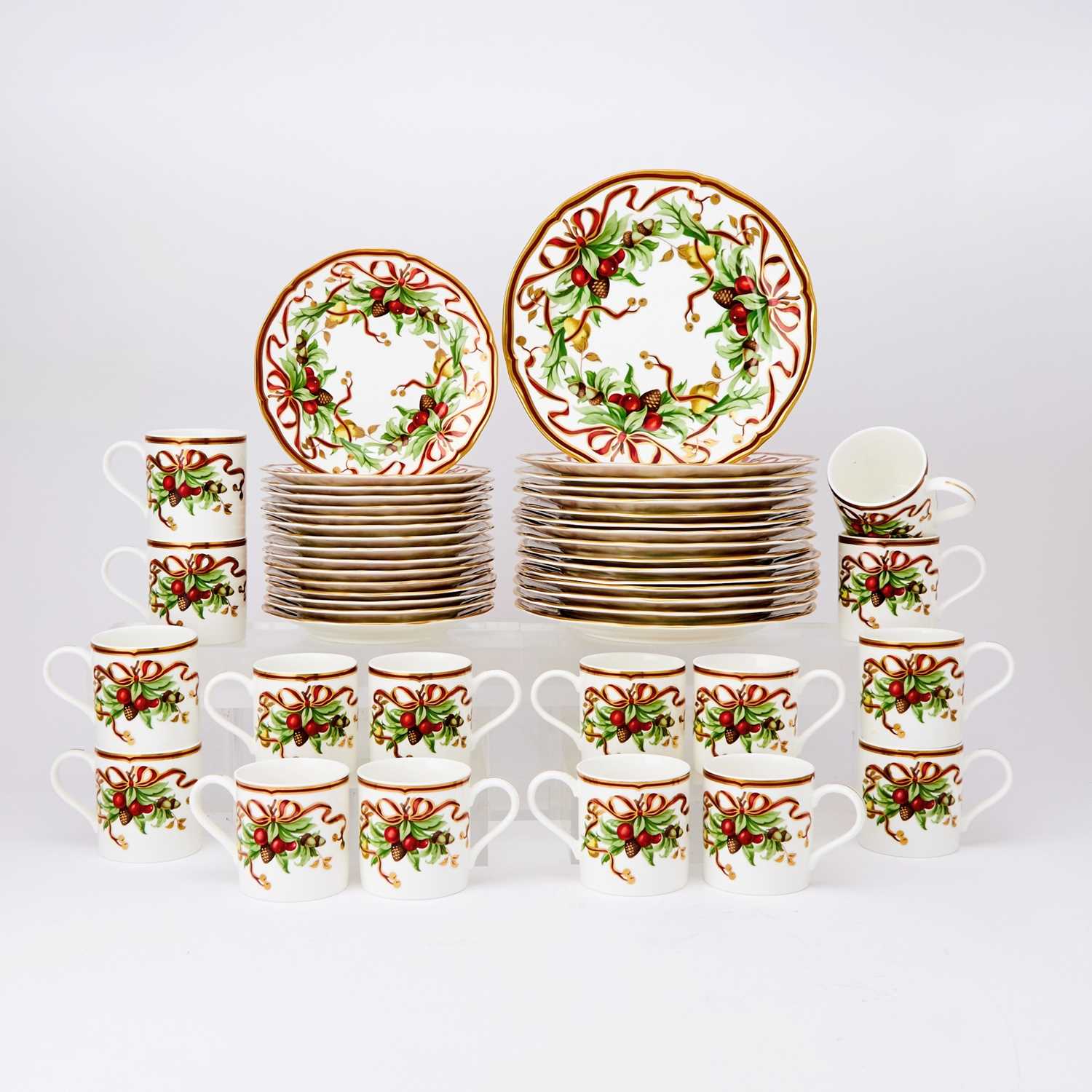 Lot 3189 - Assembled 'Tiffany Holiday' Garlanded Gilt-Decorated Porcelain Part Dinner Service