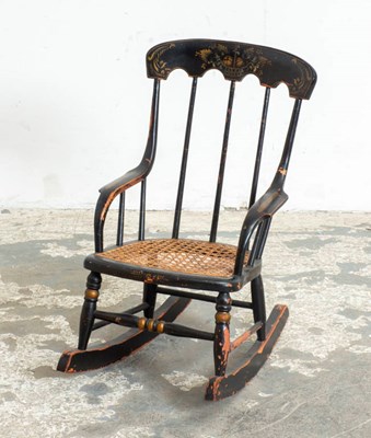 Lot 342 - American Black Painted, Gilt-Stenciled and Caned Child's “Boston” Rocking Chair