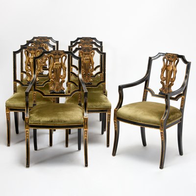 Lot 3060 - Set of Eight Italian Neoclassical Style Parcel Gilt and Ebonized Wood Dining Chairs