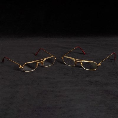 Lot 299 - Two Pairs of Cartier 'Santos' Oval Eyeglasses