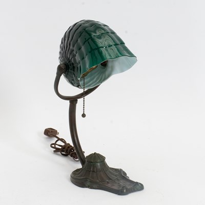Lot 286 - Art Nouveau Style Green Molded Glass and Patinated Metal Shell-Form Desk Lamp
