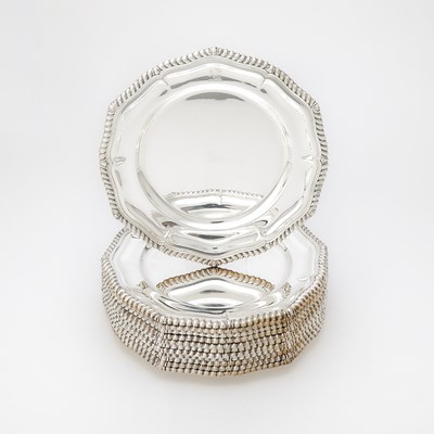 Lot 160 - Set of Twelve George III Style Silver Plated Dinner Plates