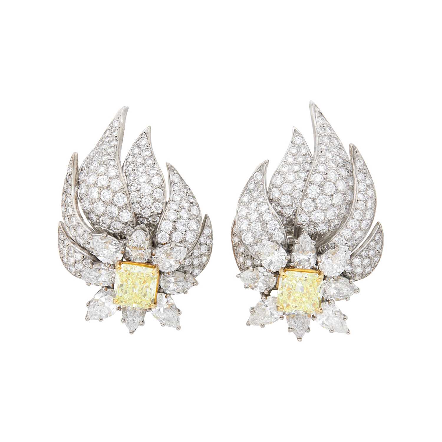 Lot 297 - Graff Pair of White Gold, Fancy Yellow Diamond and Diamond Flare Earclips
