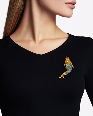 Lot 42 - Tiffany & Co., Schlumberger Gold, Sapphire, Cabochon Emerald and Enamel 'Dauphin' Clip-Brooch