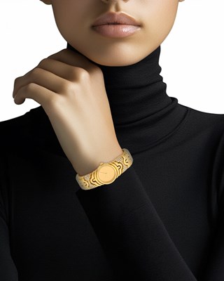 Lot 71 - Bulgari Gold and Diamond 'Parentesi' Bracelet-Watch