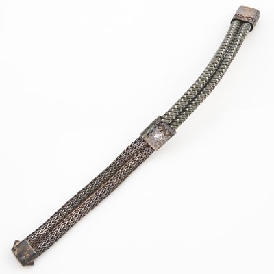 Lot 61 - Diamond Solitaire Flexible Bracelet about 0.40 ct., Silver, Metal and Rubber 30 dwt. all