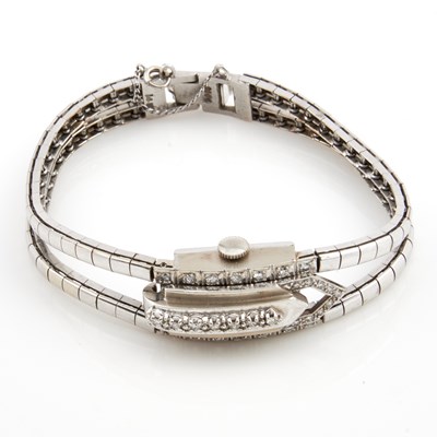 Lot 114 - Ladys Diamond Bracelet Watch, 30 diamonds about 0.50 ct., 14K 20 dwt. all
