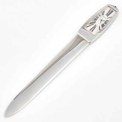 Lot 196 - Stainless Steel Letter Opener with clock, bears signature Cartier