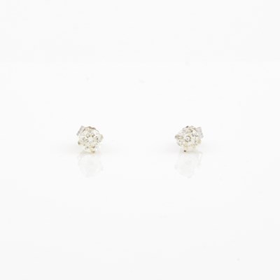 Lot 313 - Two Diamond Earrings about 0.80 ct., 14K