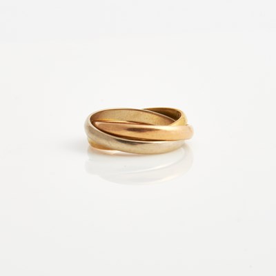 Lot 402 - Gold Trinity Ring, 18K 4 dwt., signed Cartier
