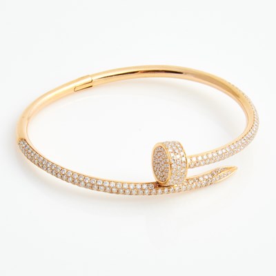 Lot 413 - Diamond Rigid Bracelet, 329 diamonds about 3.00 cts., 18K 15 dwt., bears signature Cartier